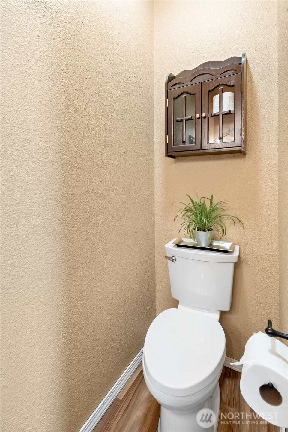 18000 Applegate Street Southwest Rochester, WA 98579 - Photo 19 of 40 a white toilet sitting next to a white sink and vanity