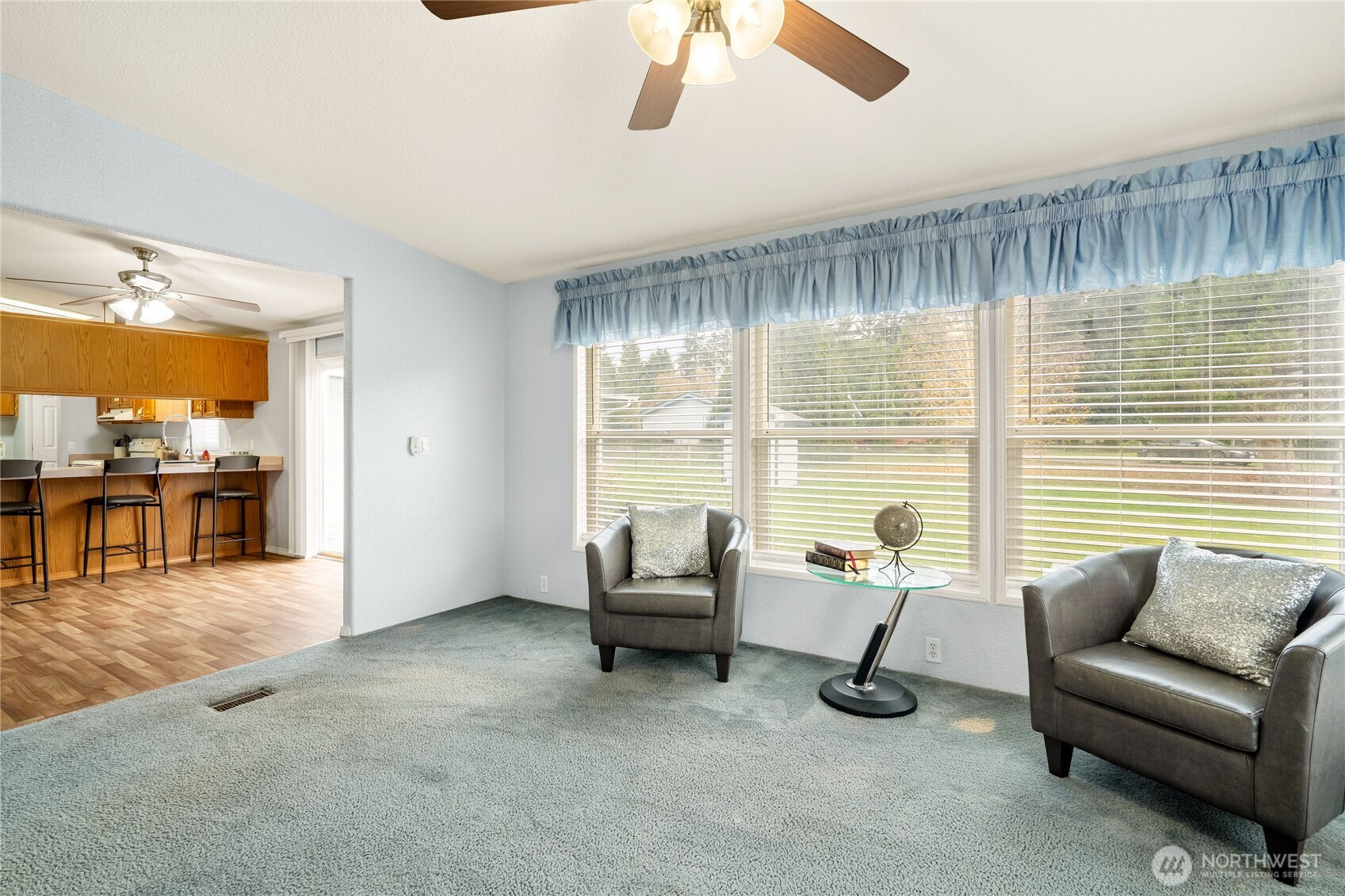 18000 Applegate Street Southwest Rochester, WA 98579 - Photo 23 of 40 a living room with furniture and a large window