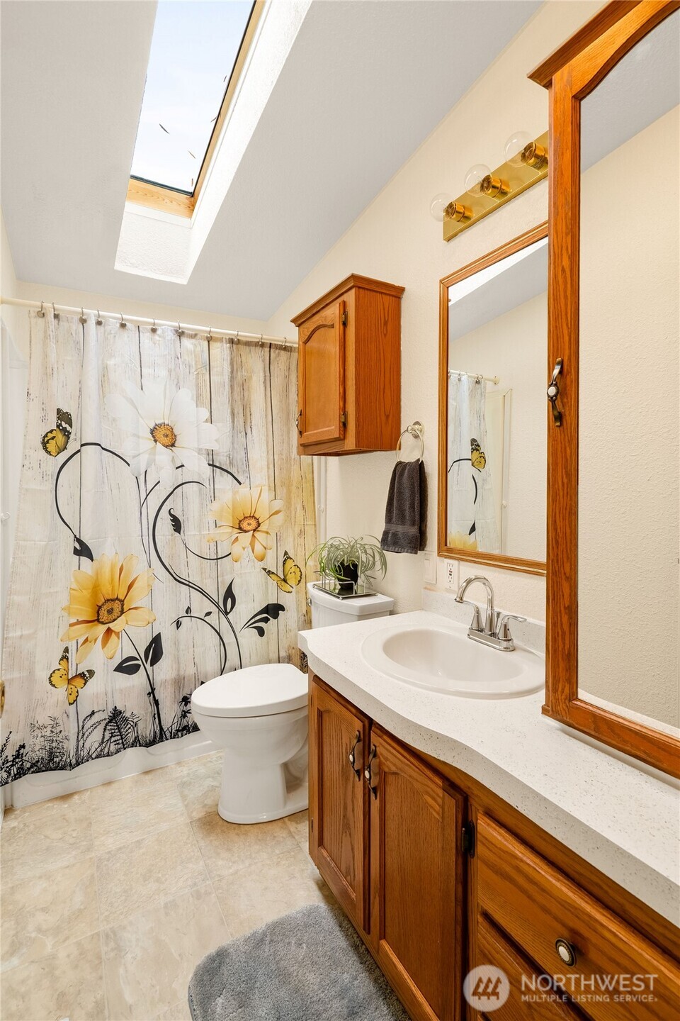18000 Applegate Street Southwest Rochester, WA 98579 - Photo 26 of 40 a bathroom with a sink and a mirror