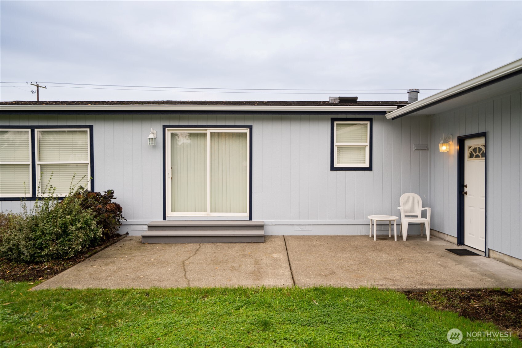 18000 Applegate Street Southwest Rochester, WA 98579 - Photo 31 of 40 a backyard of a house with table and chairs