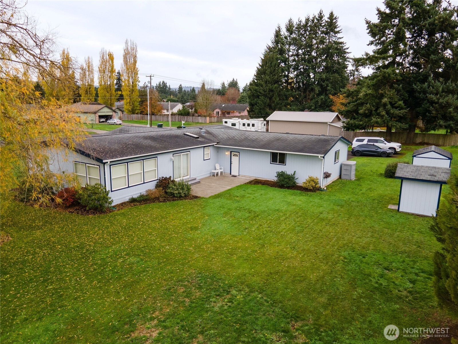 18000 Applegate Street Southwest Rochester, WA 98579 - Photo 35 of 40 a view of a house with a big yard and large trees