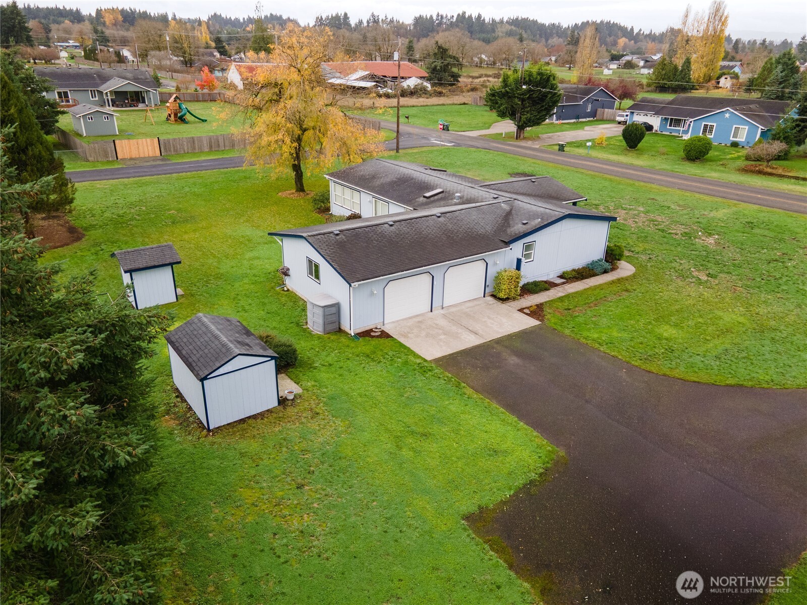 18000 Applegate Street Southwest Rochester, WA 98579 - Photo 36 of 40 an aerial view of a house with garden space and lake view