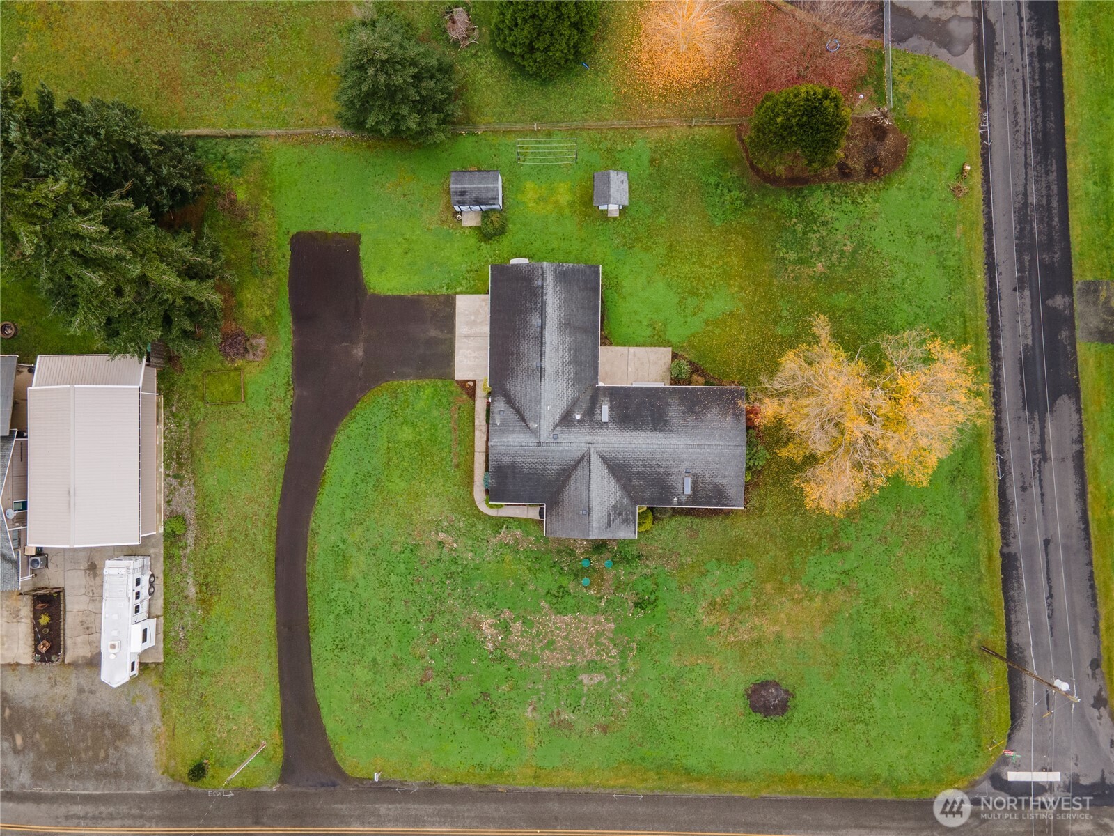 18000 Applegate Street Southwest Rochester, WA 98579 - Photo 39 of 40 an aerial view of a house with a yard basket ball court and outdoor seating