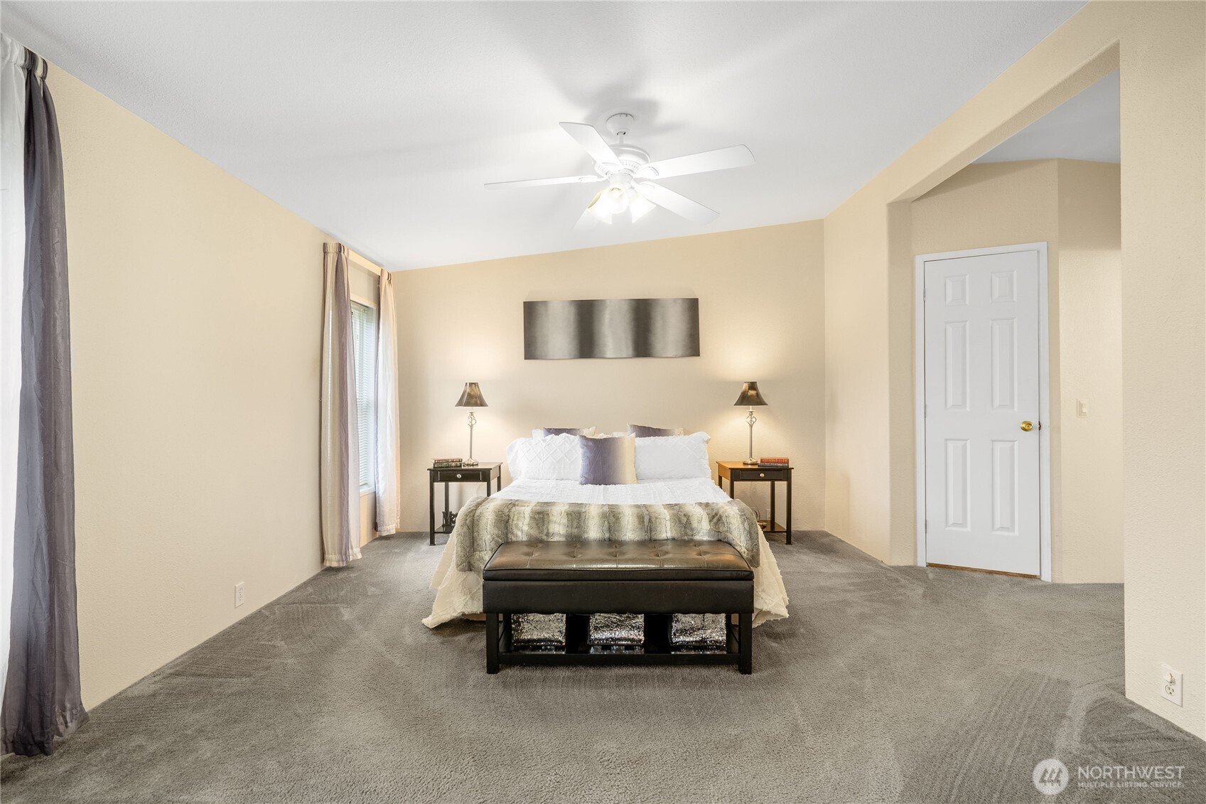 18000 Applegate Street Southwest Rochester, WA 98579 - Photo 7 of 40 a bed room with a bed and a chandelier