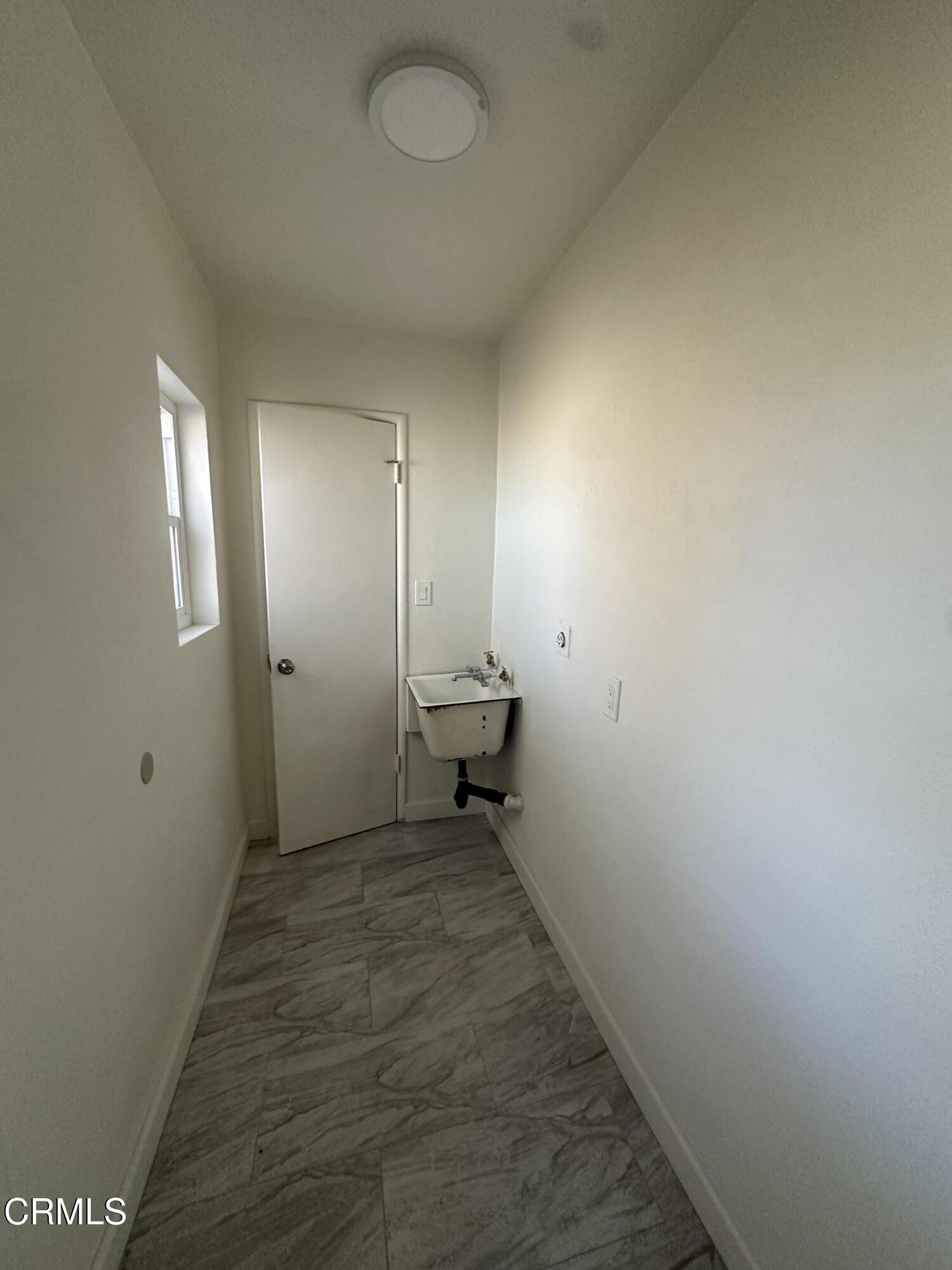 741 New Depot Street Los Angeles, CA 90012 - Photo 9 of 12 a view of an empty room