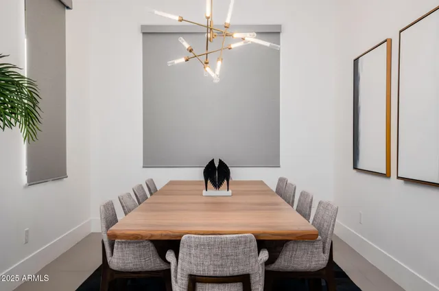 a kitchen with stainless steel appliances a stove a sink and a refrigerator