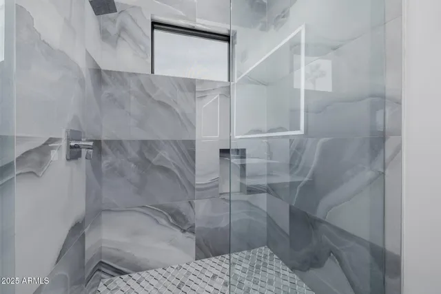 a room with furniture and flat screen tv