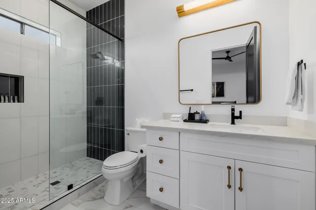a utility room with sink dryer and washer