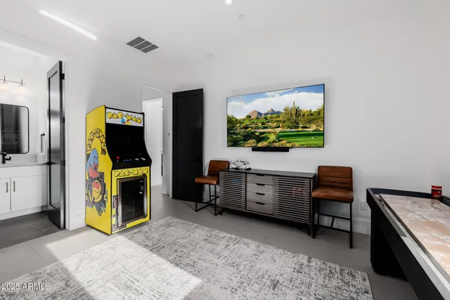a view of a patio with couches and a table and chairs
