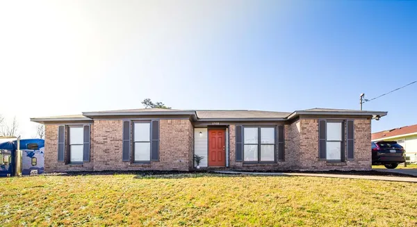a front view of a house with swimming pool