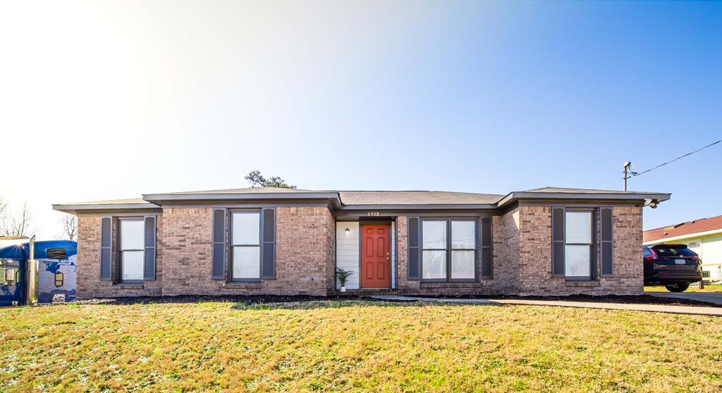 a front view of a house with swimming pool