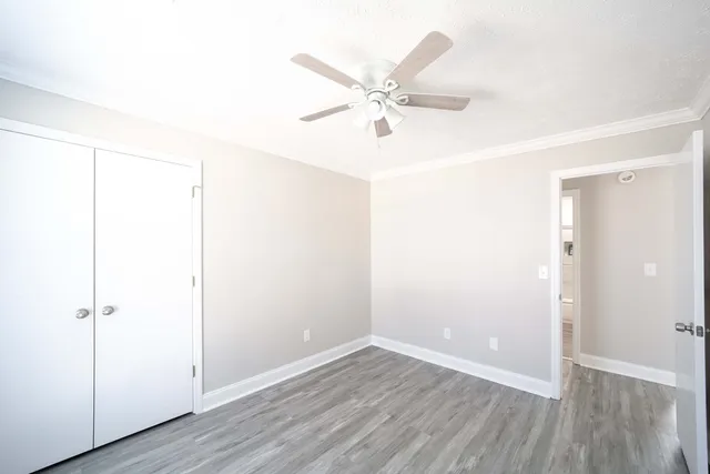 a bathroom with a sink mirror toilet and shower