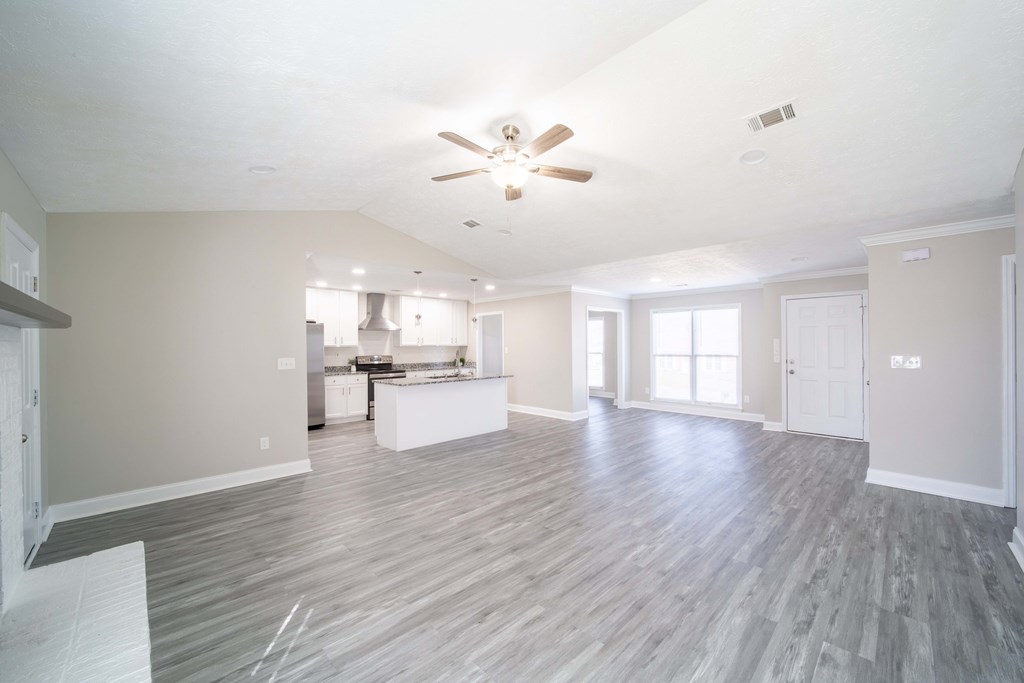 6308 Browning Drive Columbus, GA 31907 - Photo 6 of 19 a view of an empty room with window and wooden floor
