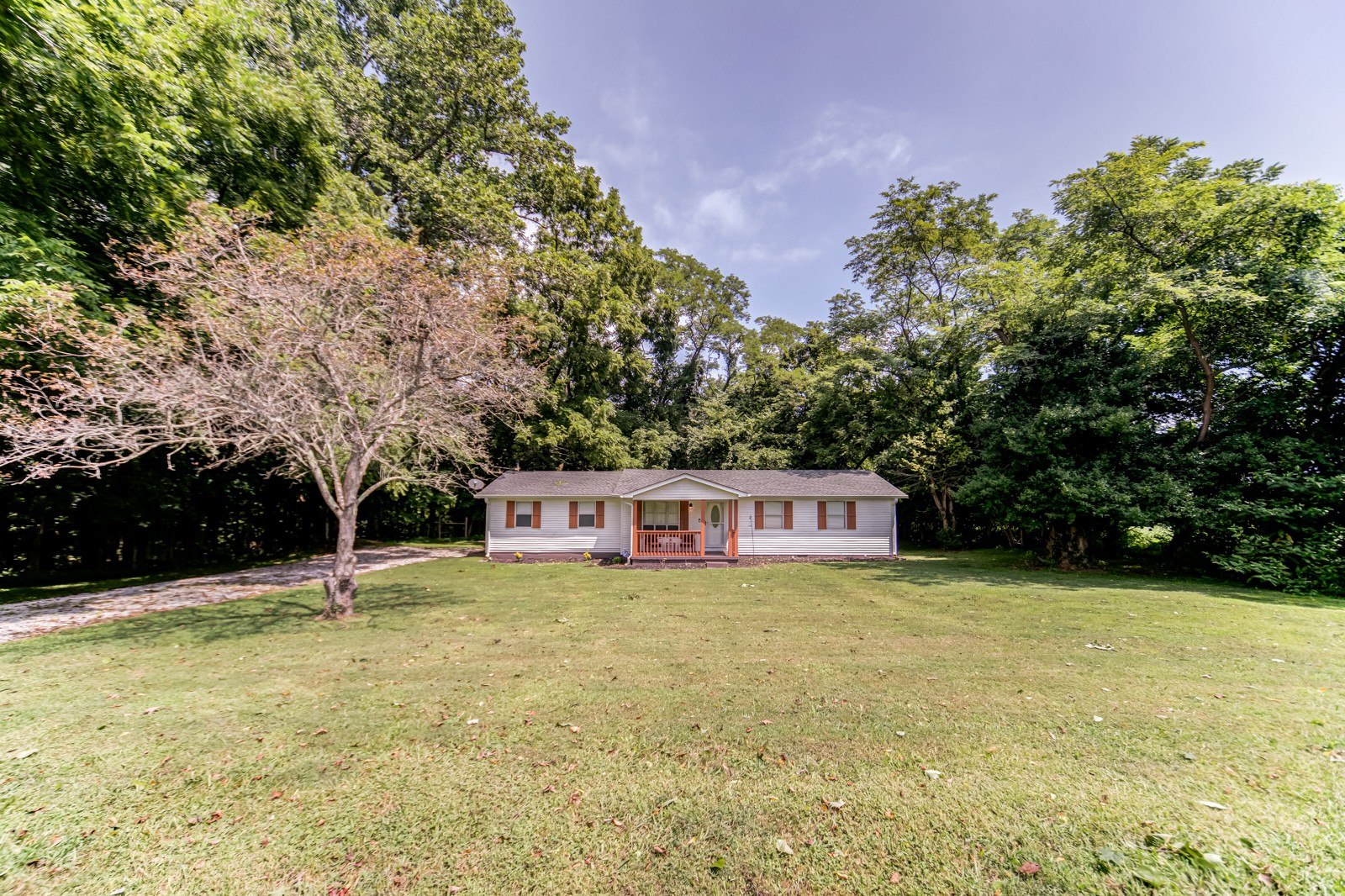 325 Denning Ford Road Portland, TN 37148 - Photo 3 of 35 a view of a house with swimming pool and sitting area