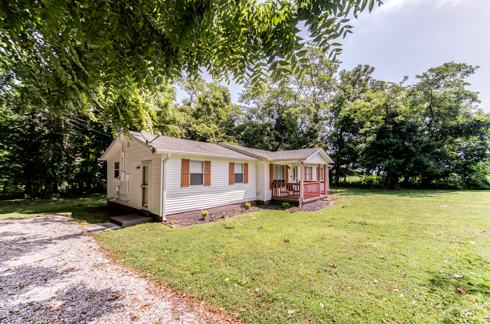 325 Denning Ford Road Portland, TN 37148 - Photo 6 of 35 a house that has a big yard in front of it