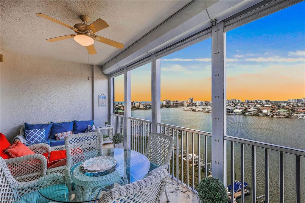 410 Flagship Drive, Unit 903 Naples, FL 34108 - Photo 1 of 29 a living room with furniture