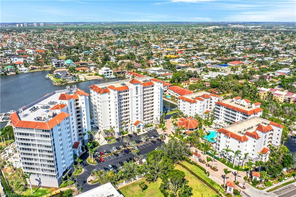 410 Flagship Drive, Unit 903 Naples, FL 34108 - Photo 21 of 29 an aerial view of city and lake