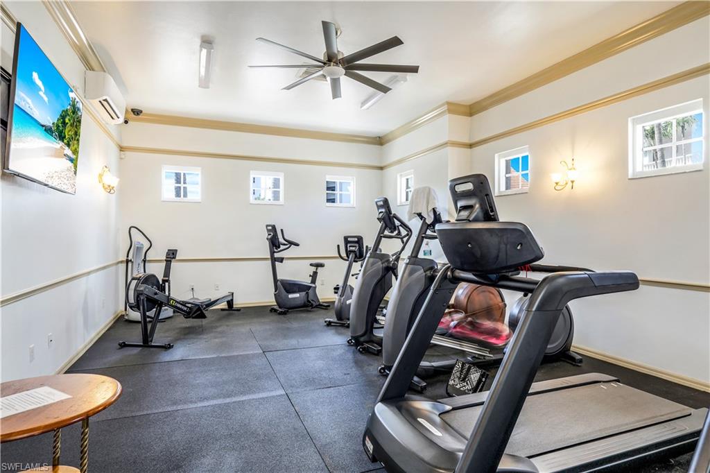 410 Flagship Drive, Unit 903 Naples, FL 34108 - Photo 28 of 29 a view of a room with gym equipment