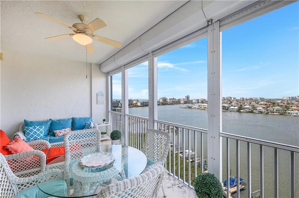 410 Flagship Drive, Unit 903 Naples, FL 34108 - Photo 3 of 29 a living room with furniture