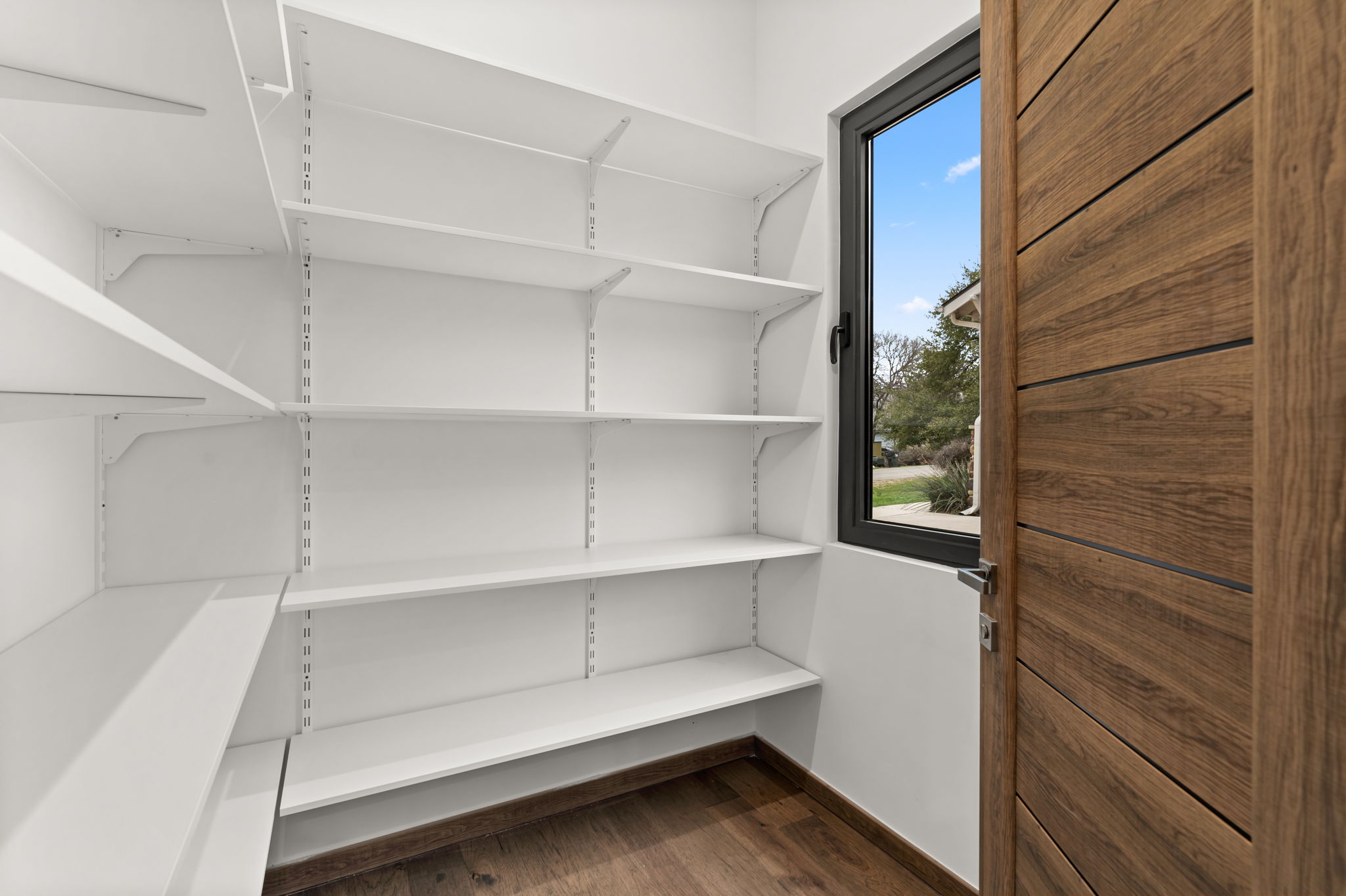 2915 Chisholm Trail Austin, TX 78734 - Photo 13 of 35 a view of an empty walk in closet