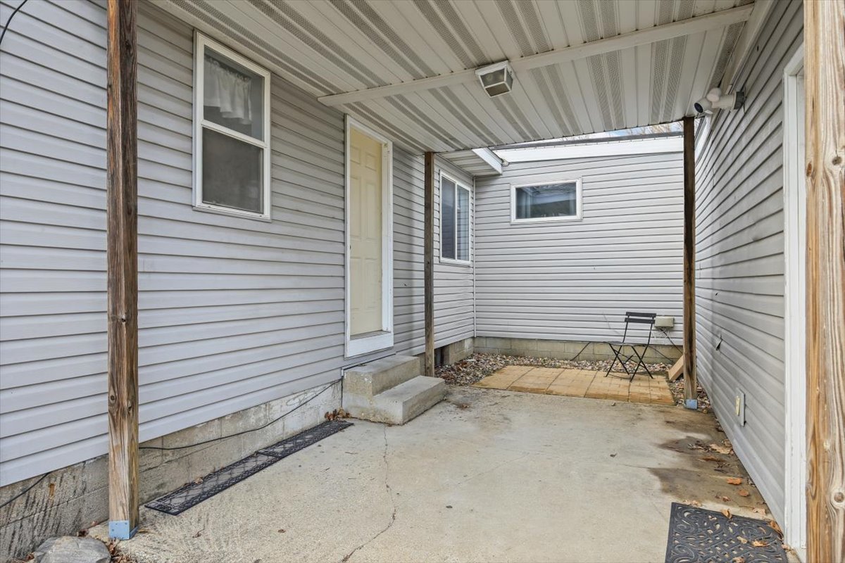 8 University Court Normal, IL 61761 - Photo 16 of 19 a view of a porch with a door