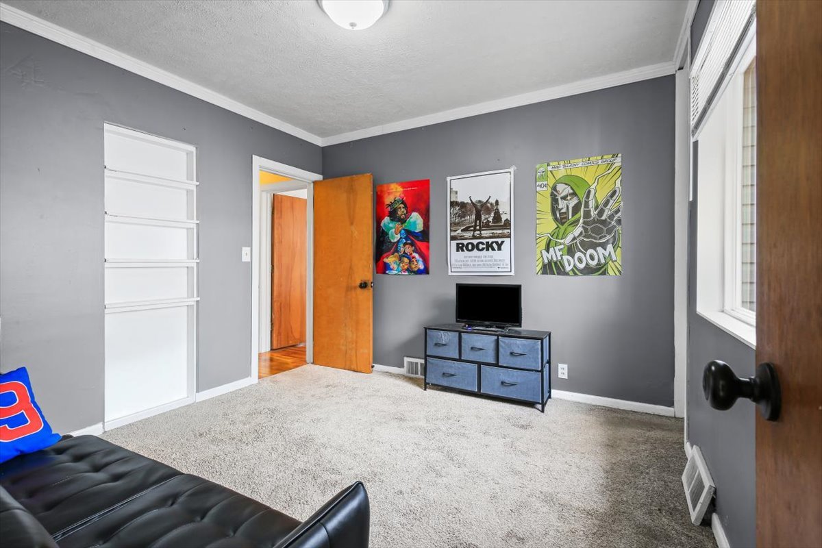 8 University Court Normal, IL 61761 - Photo 18 of 19 a bedroom with furniture and a window
