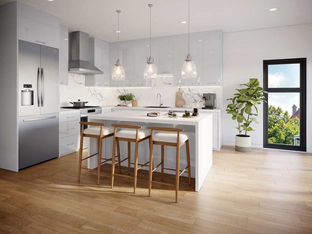 44 Cottage Street, Unit 1 Boston, MA 02128 - Photo 2 of 10 a kitchen with granite countertop cabinets a center island and appliances