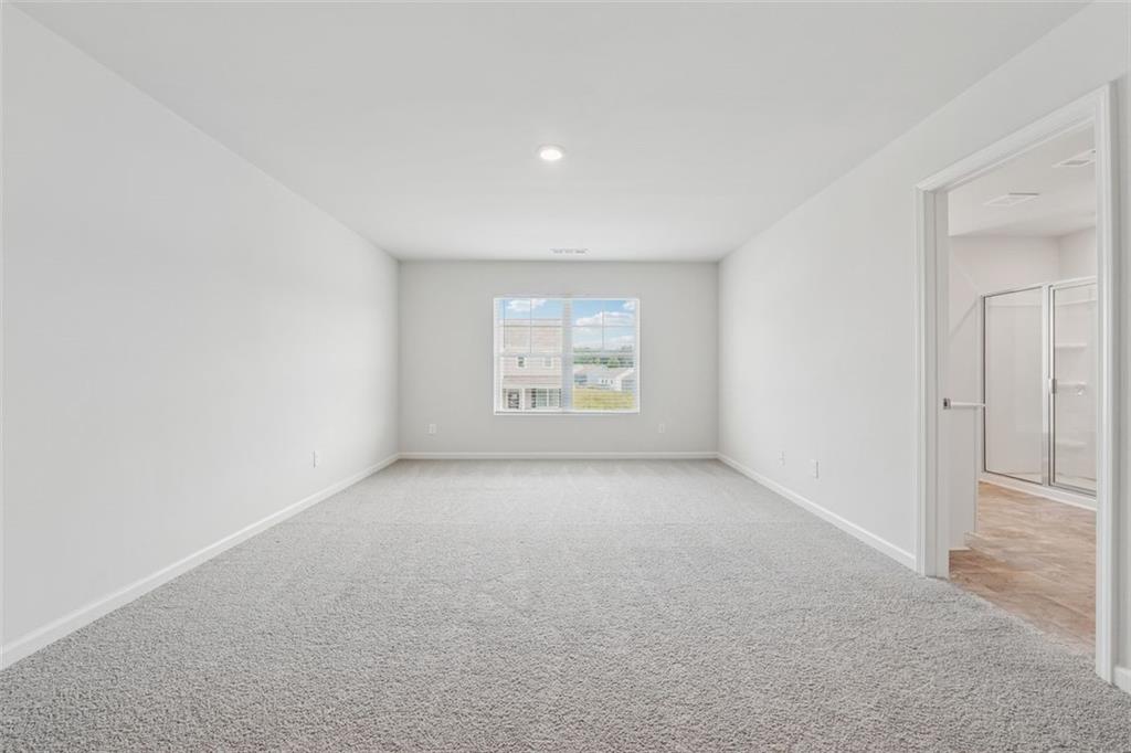 96 Quail Bend Way Dallas, GA 30157 - Photo 17 of 58 an empty room with windows