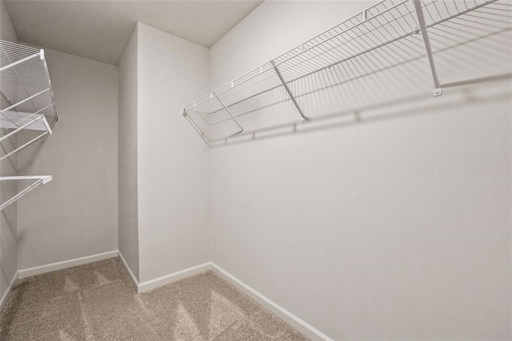 96 Quail Bend Way Dallas, GA 30157 - Photo 22 of 58 a view of a room with racks on the wall