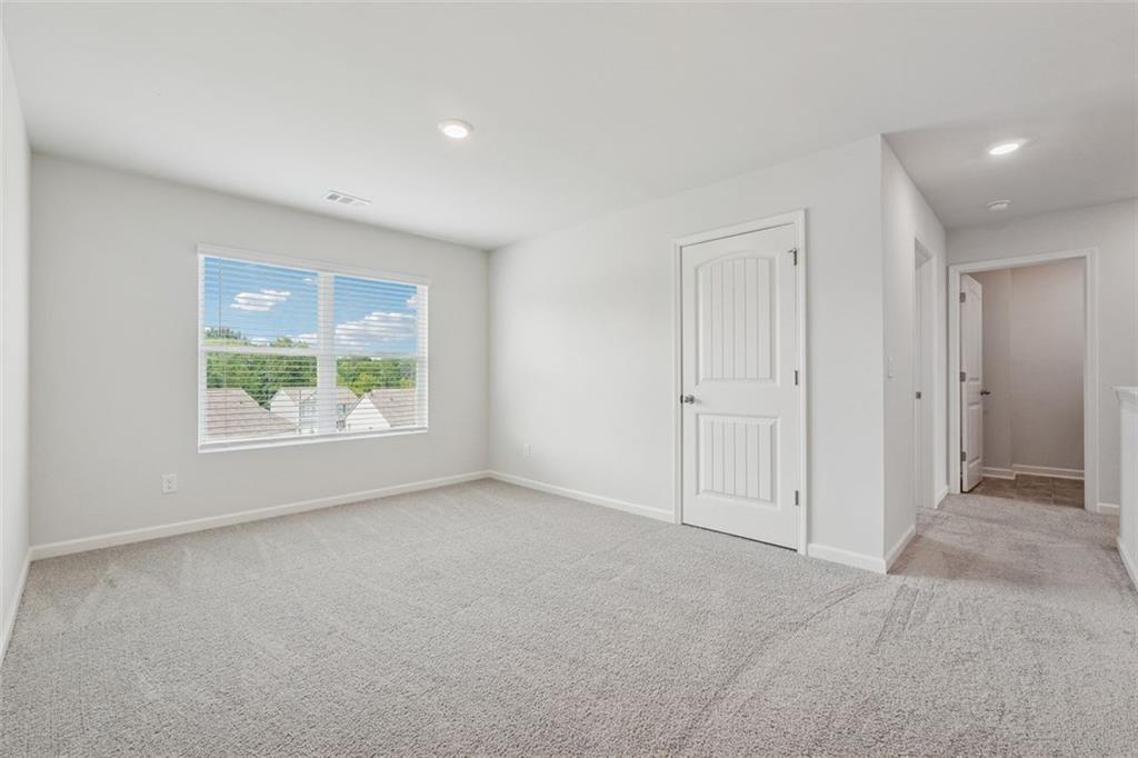 96 Quail Bend Way Dallas, GA 30157 - Photo 26 of 58 a view of an empty room with a window
