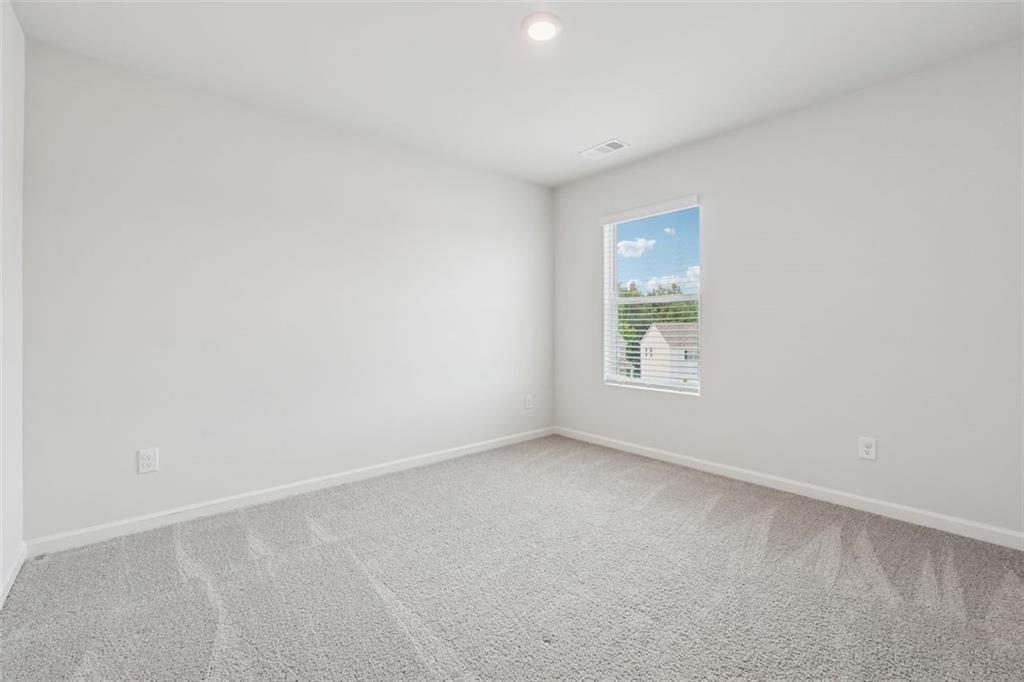 96 Quail Bend Way Dallas, GA 30157 - Photo 28 of 58 an empty room with a window