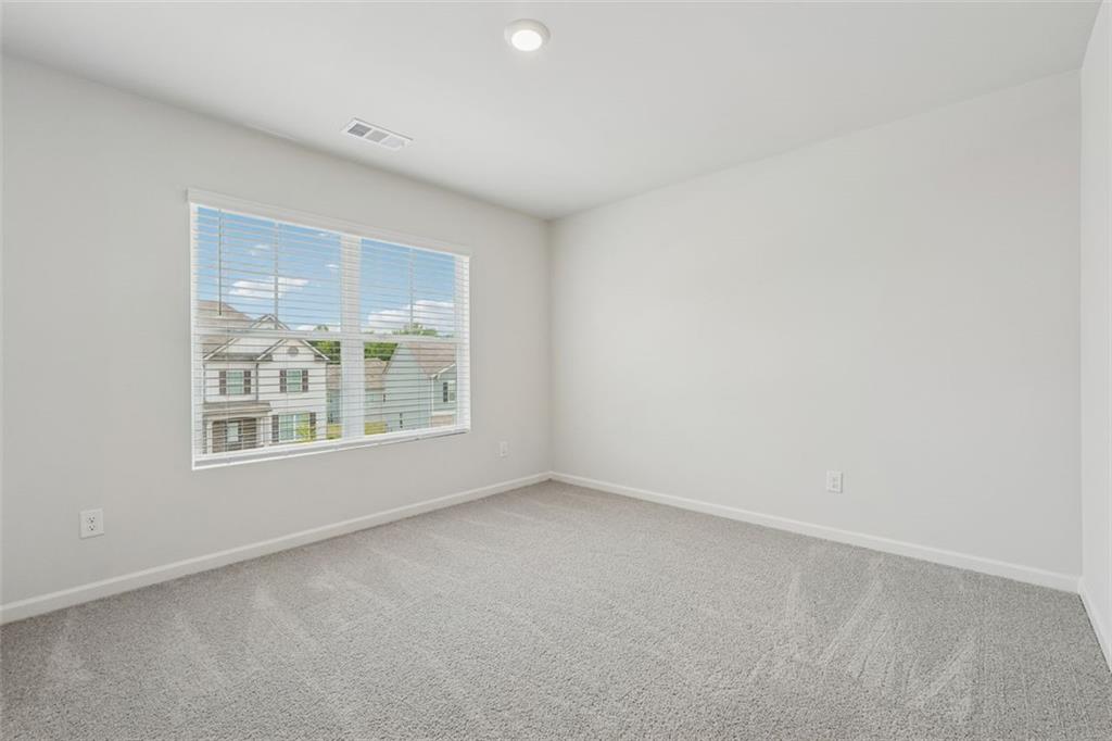 96 Quail Bend Way Dallas, GA 30157 - Photo 32 of 58 an empty room with a window