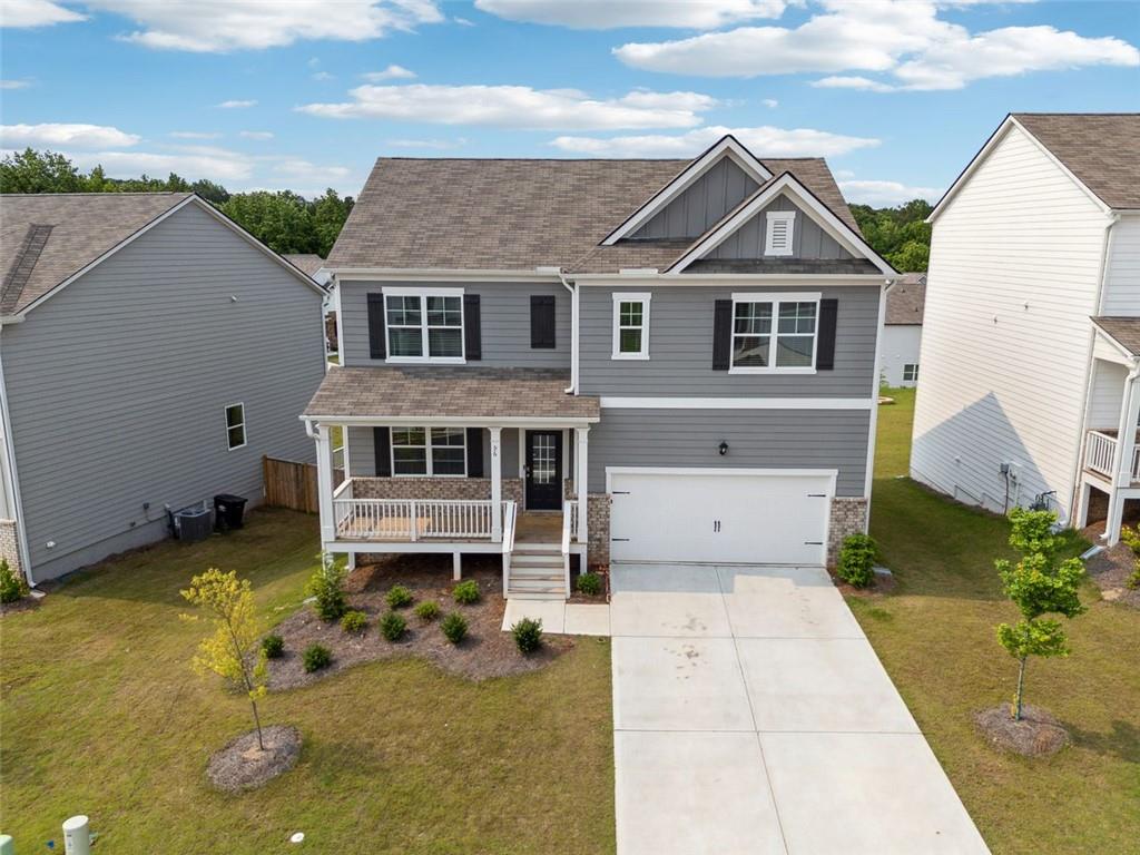 96 Quail Bend Way Dallas, GA 30157 - Photo 39 of 58 a front view of a house with garden