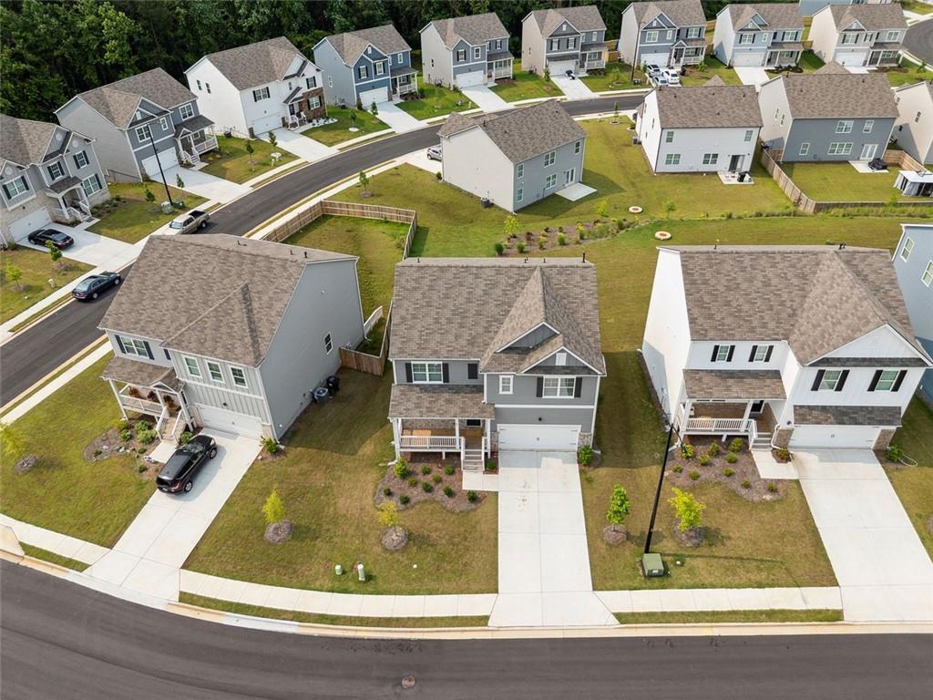 96 Quail Bend Way Dallas, GA 30157 - Photo 40 of 58 an aerial view of a house with swimming pool