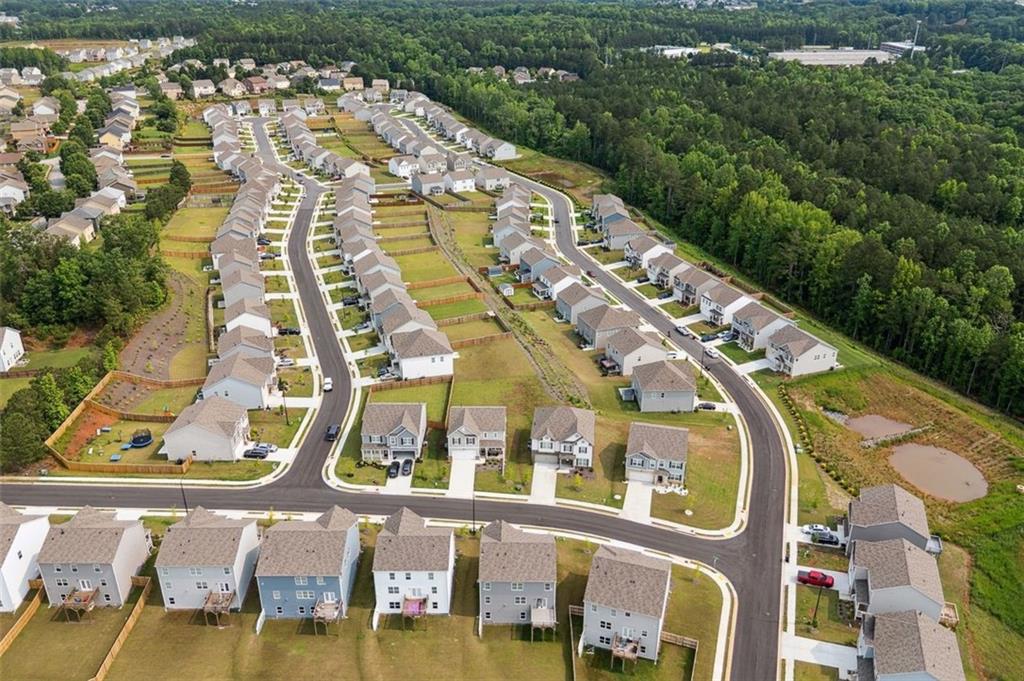 96 Quail Bend Way Dallas, GA 30157 - Photo 42 of 58 a view of swimming pool with outdoor seating and yard