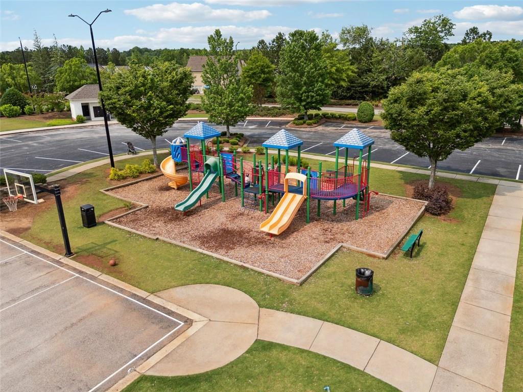 96 Quail Bend Way Dallas, GA 30157 - Photo 52 of 58 an aerial view of a tennis ground with large trees