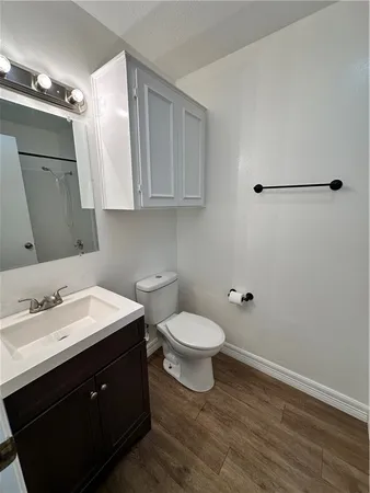 a bathroom with a sink and a toilet