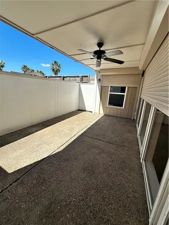a view of chandelier and kitchen