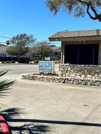 a view of a house with a ocean view