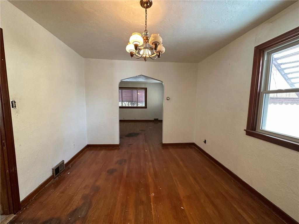 809 St Clair Avenue Clairton, PA 15025 - Photo 6 of 15 wooden floor in an empty room with a window