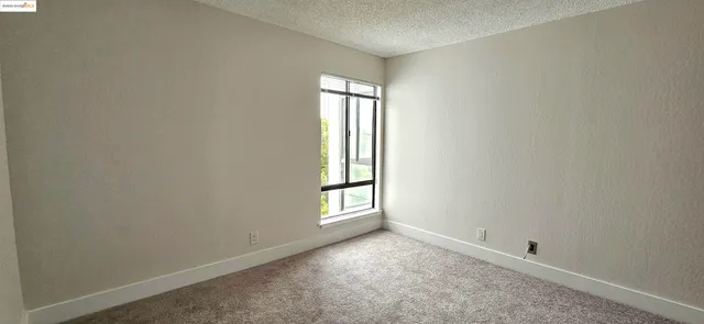 a view of a garden from a balcony