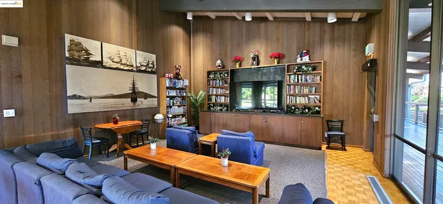 a view of a terrace with wooden floor and fence