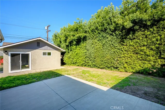 a view of backyard with green space