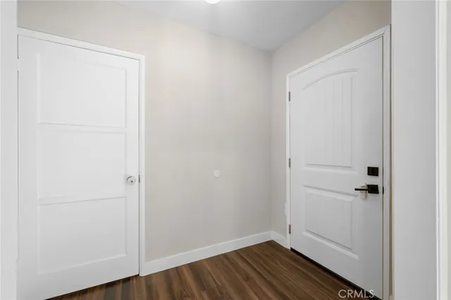 a view of small space with wooden floor