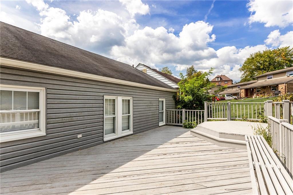 118 Oak Spring Road Canonsburg, PA 15317 - Photo 20 of 32 This large multi-level deck extends the living space outdoors. Sliding doors provide easy access from the home to the backyard.