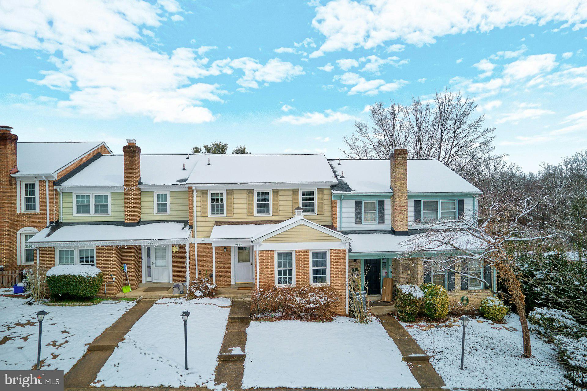 9634 Blincoe Court Burke, VA 22015 - Photo 1 of 53 a front view of a house with a garden