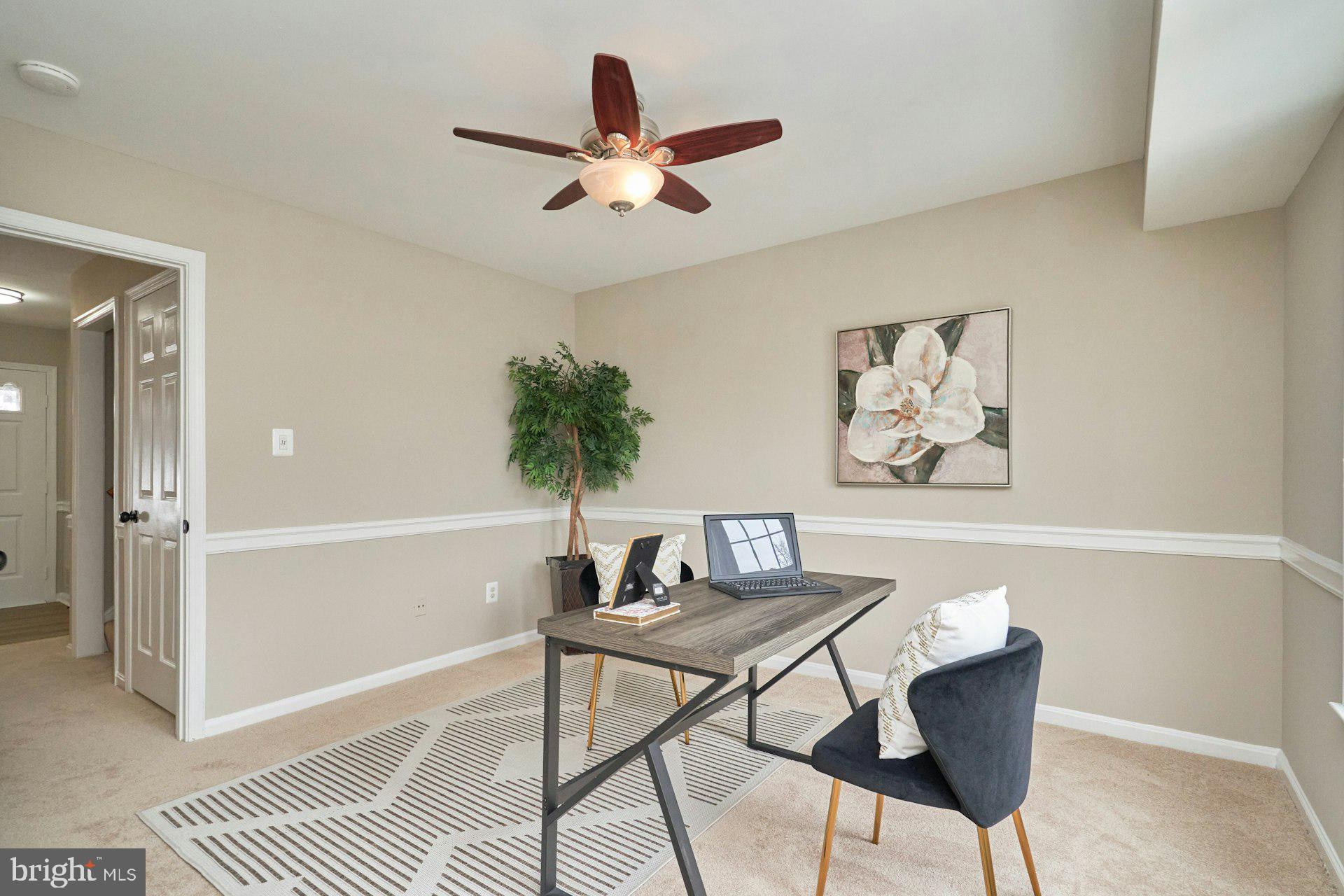 9634 Blincoe Court Burke, VA 22015 - Photo 11 of 53 a workspace with furniture and a chandelier fan