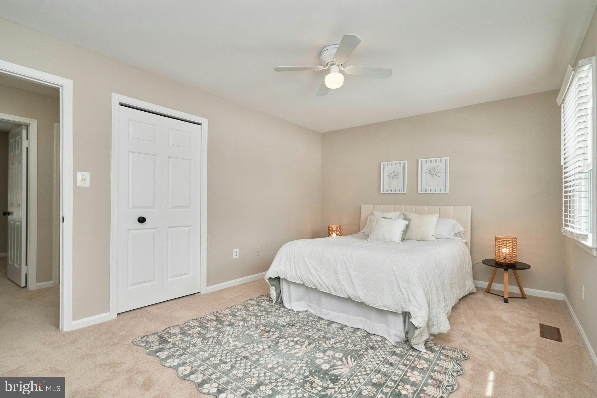 9634 Blincoe Court Burke, VA 22015 - Photo 19 of 53 a bedroom with a bed and a window