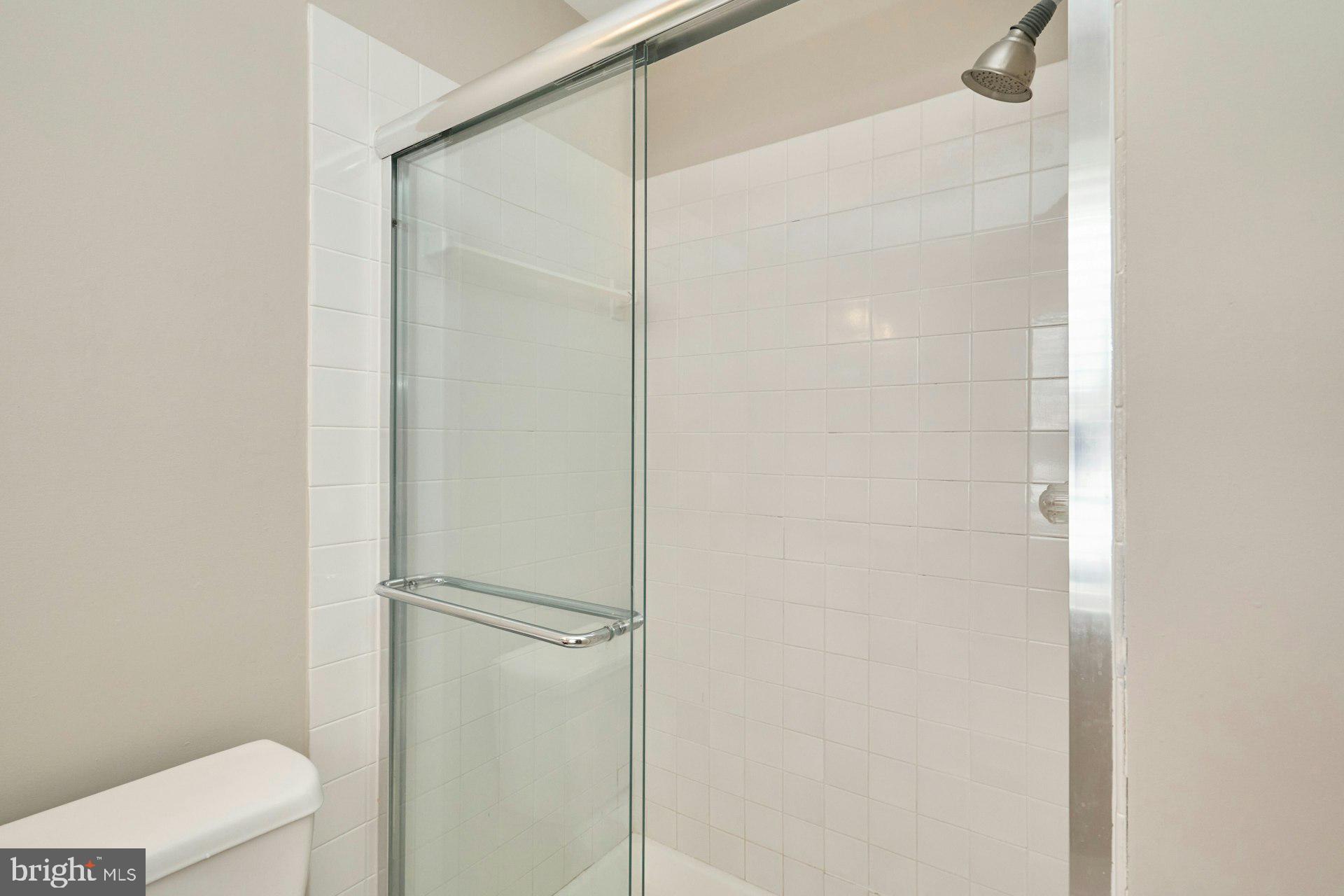 9634 Blincoe Court Burke, VA 22015 - Photo 22 of 53 a bathroom with a shower