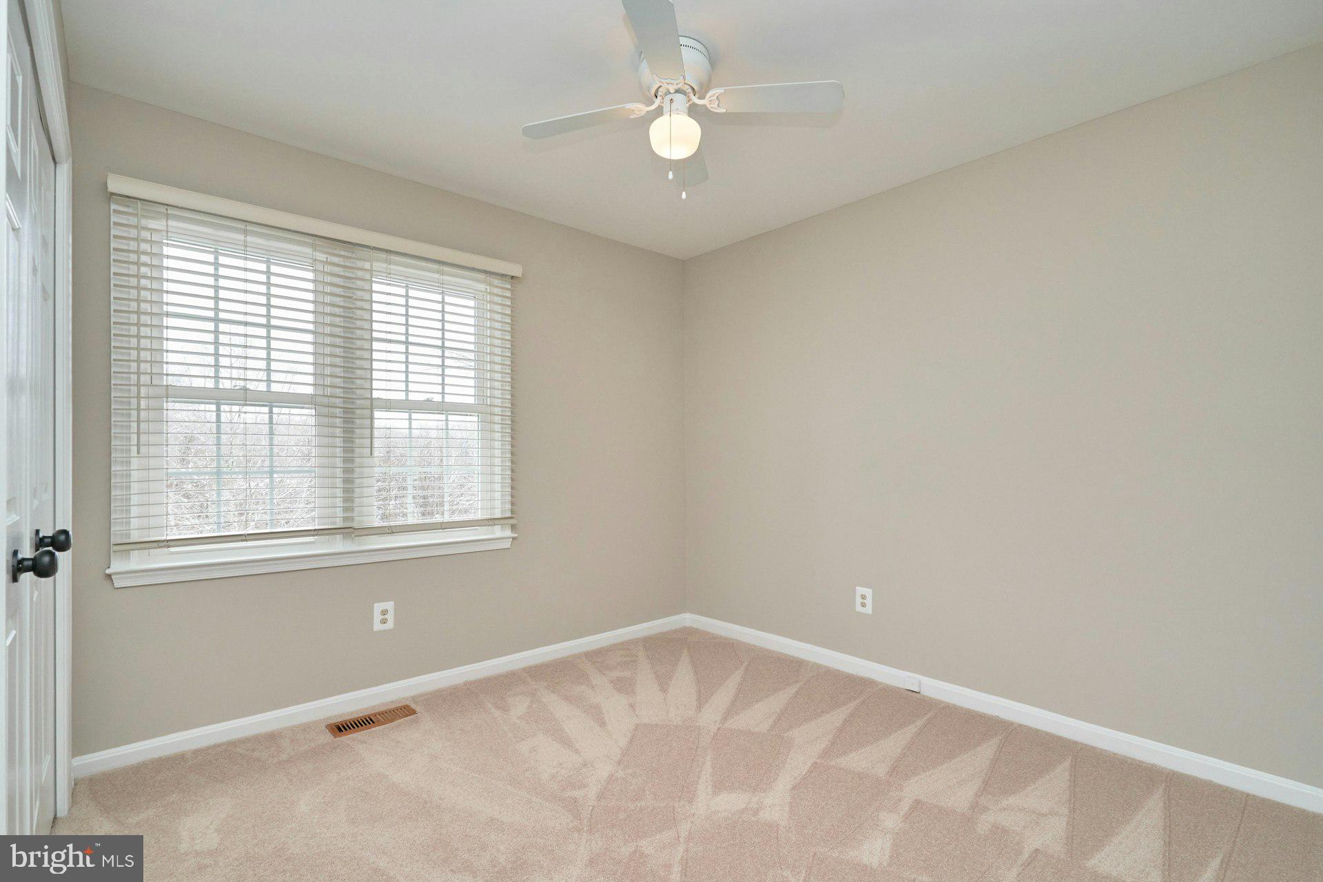9634 Blincoe Court Burke, VA 22015 - Photo 24 of 53 an empty room with a window